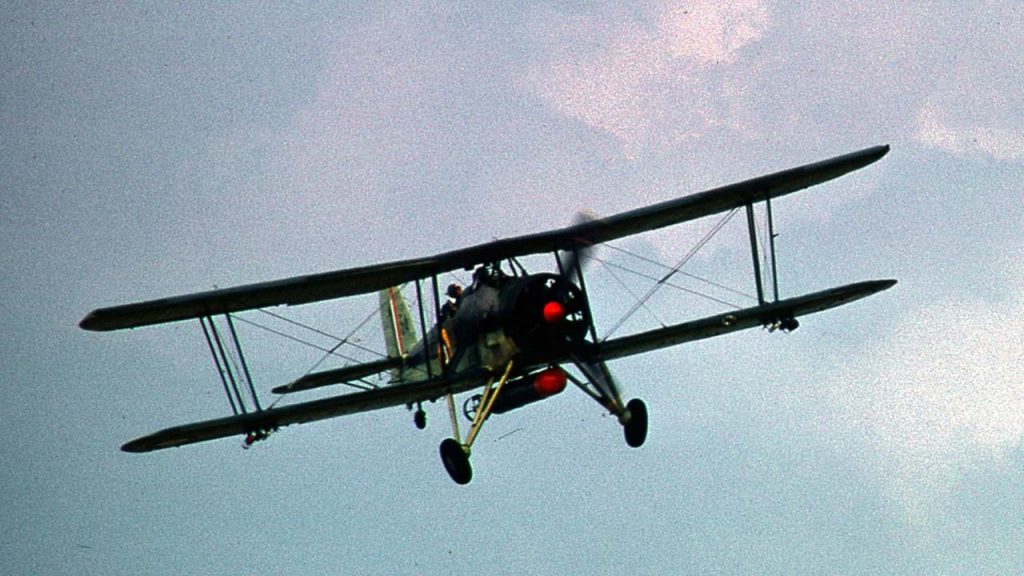 Torpedo Attacks amid Shrapnel and Shell Splashes